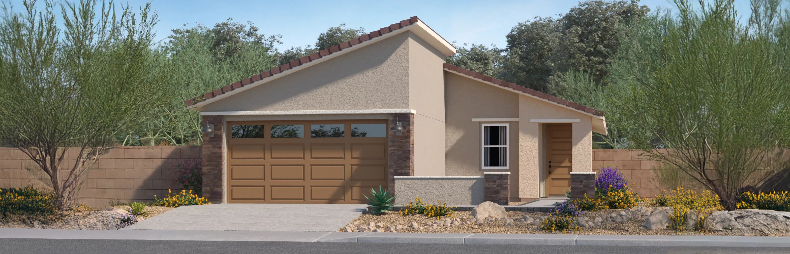 Single-story house with a sloped roof, two-car garage, stone accents, and desert landscaping in front.