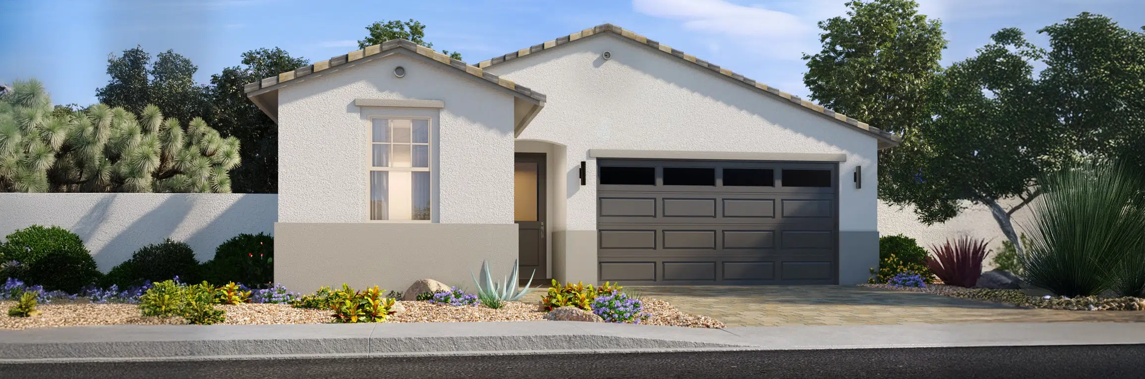 Single-story modern house with a two-car garage, white exterior, and desert landscaping in the front yard.