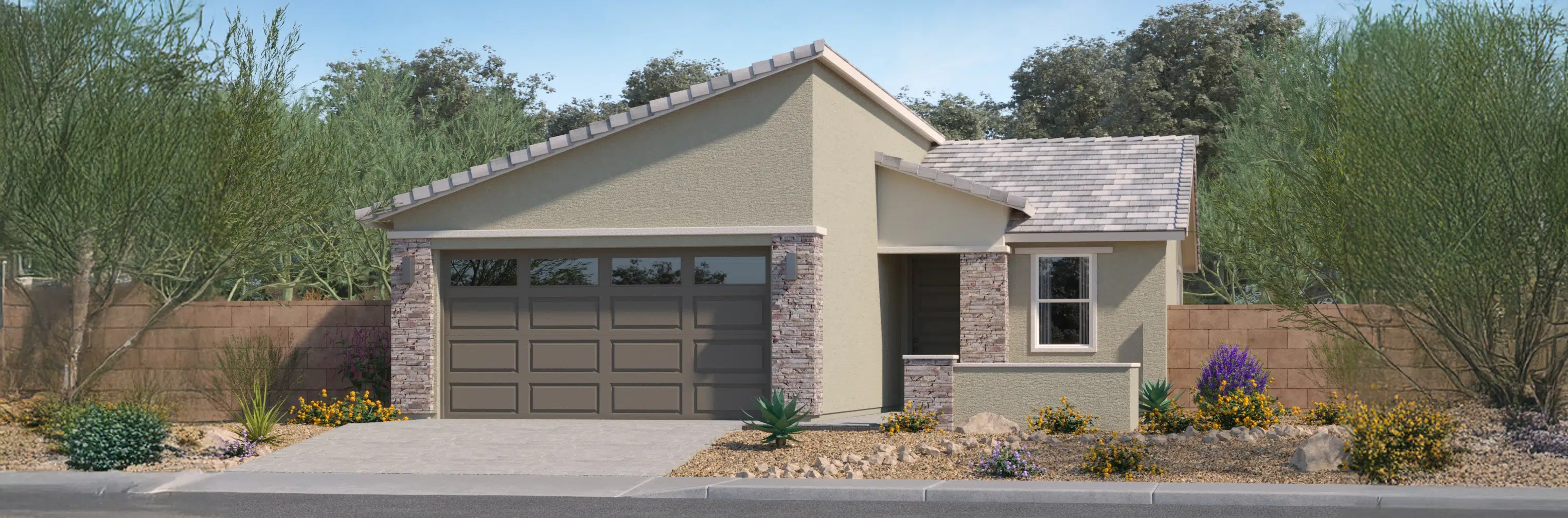 Single-story modern house with a two-car garage, stone and stucco exterior, desert landscaping, and a sloped roof.