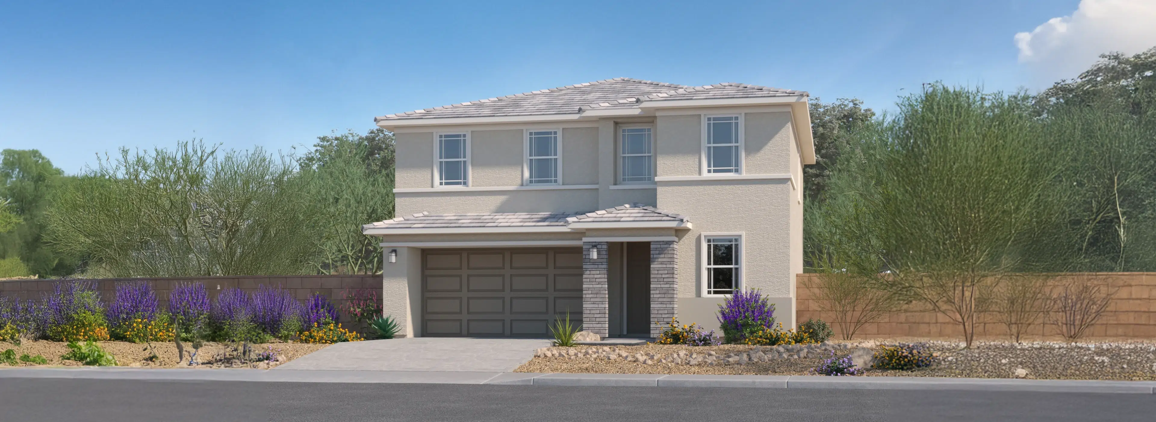 Two-story beige house with a single-car garage, desert landscaping, and a paved driveway under a clear blue sky.