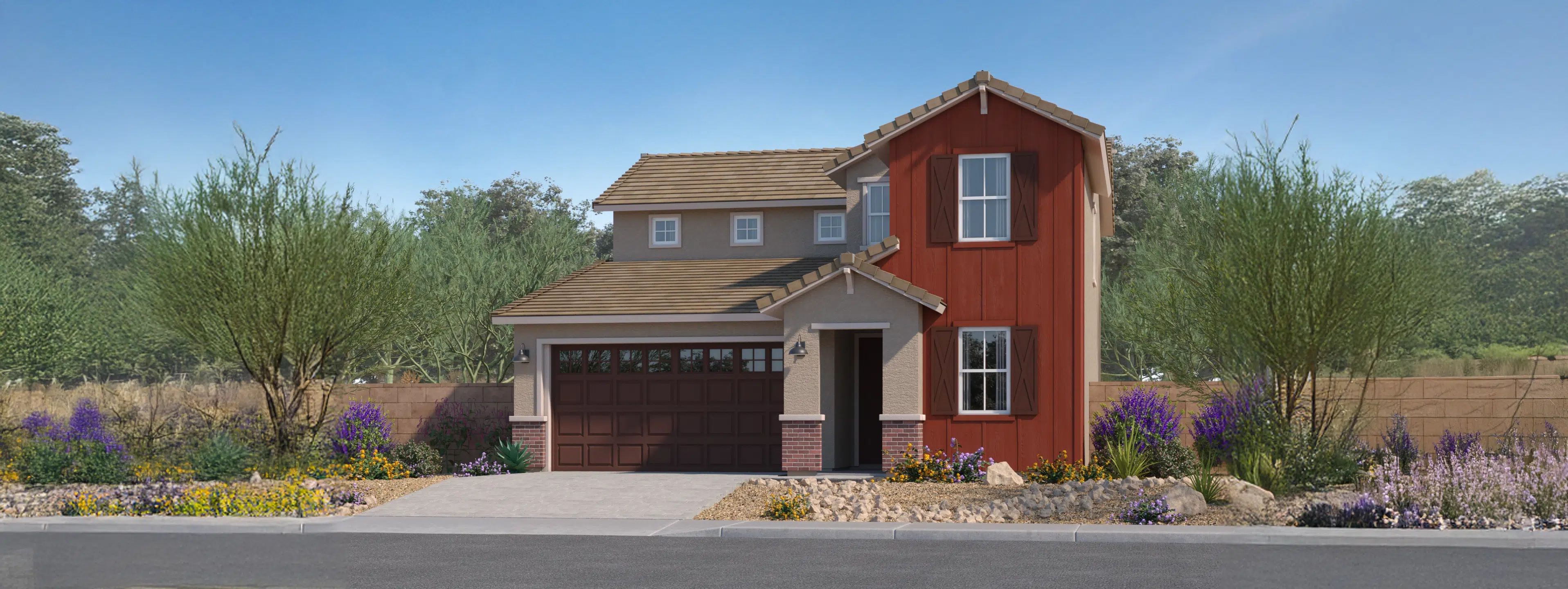 Two-story house with brown roof, red siding on one section, attached garage, landscaped front yard with desert plants and flowers, and a paved driveway.