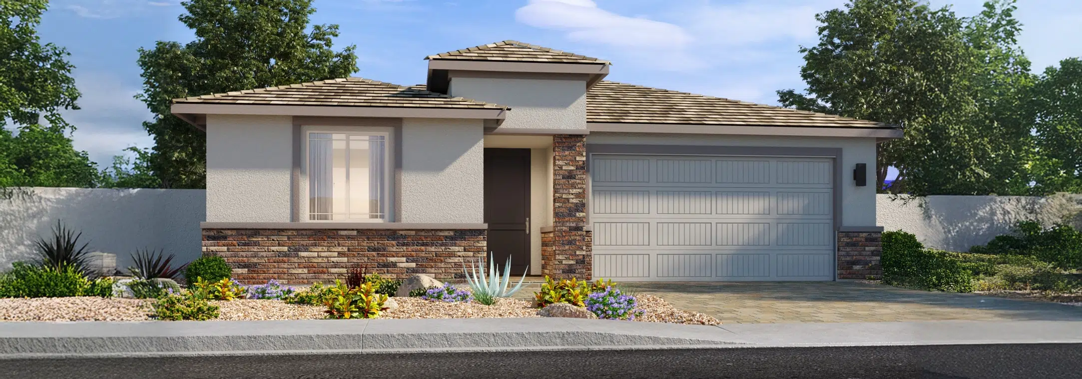 Single-story suburban house with a two-car garage, brick and stucco exterior, desert landscaping, and a paved driveway under a partly cloudy sky.