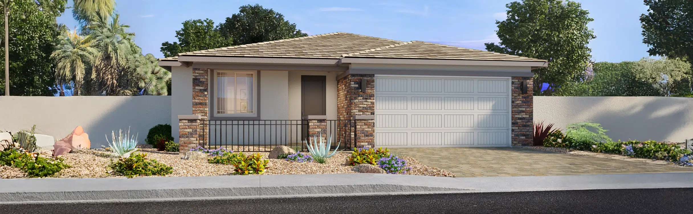 Single-story house with a double garage, stone accents, desert landscaping, and a paved driveway, set against a backdrop of trees and a blue sky.