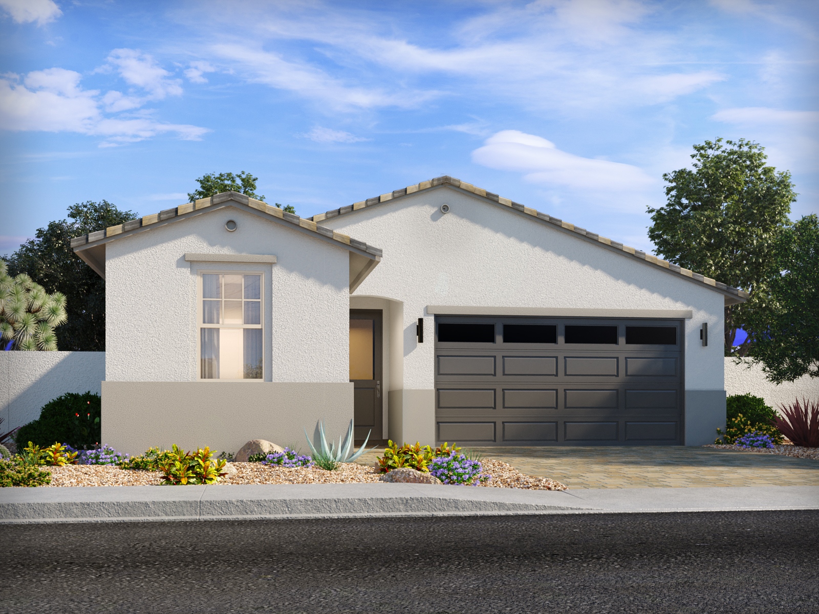 Single-story modern house with a two-car garage, light exterior walls, and a landscaped front yard with desert plants under a blue sky.