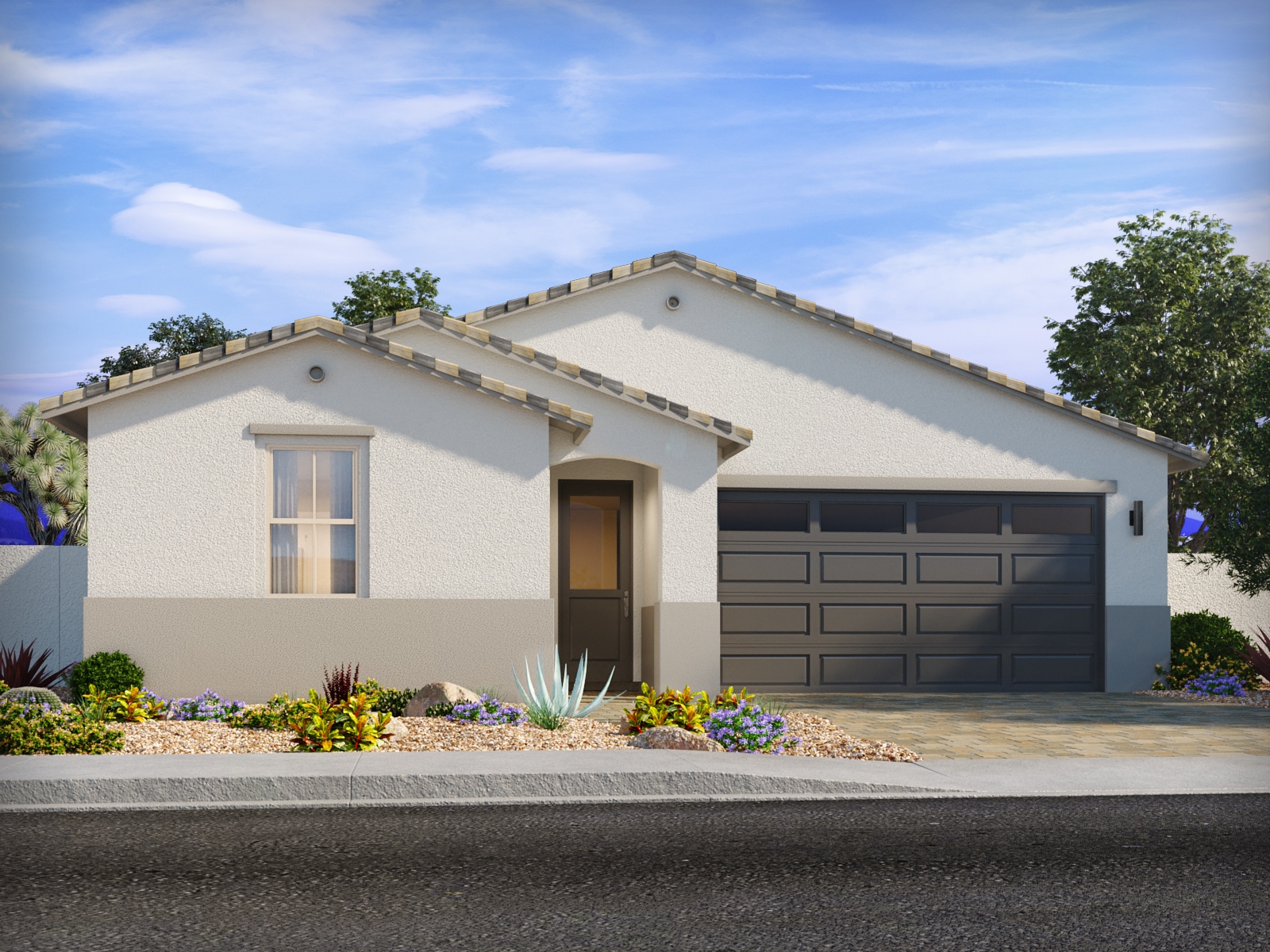 Single-story house with white stucco exterior, gray tile roof, dark garage door, small front porch, and desert landscaping under a blue sky.