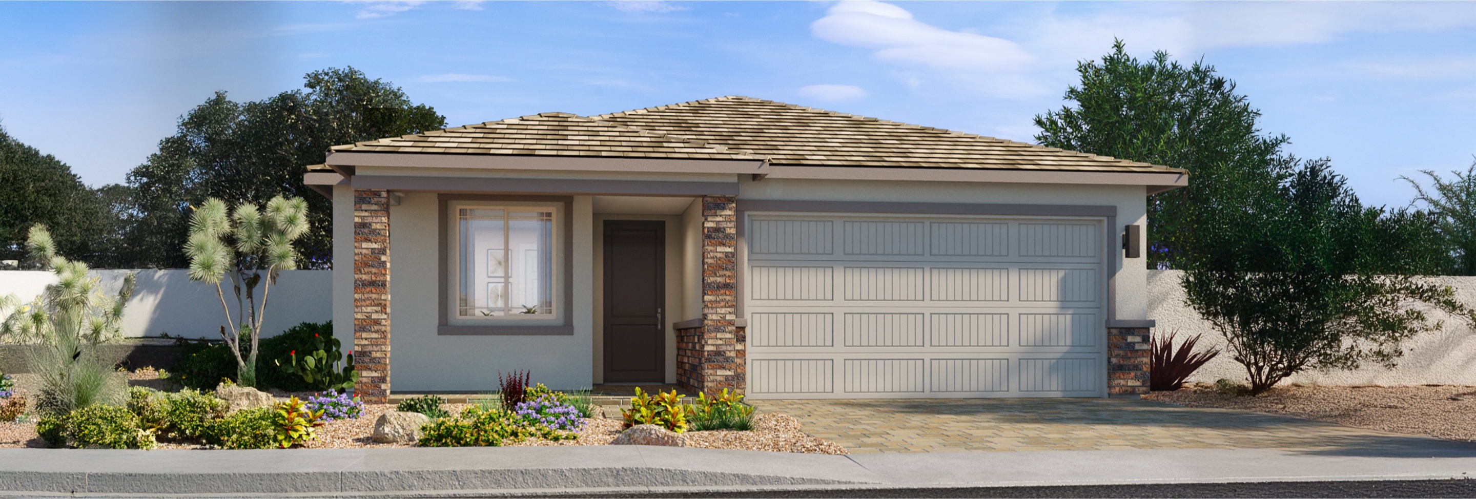 Single-story house with a two-car garage, brick and stucco exterior, desert landscaping, and a paved driveway under a partly cloudy sky.