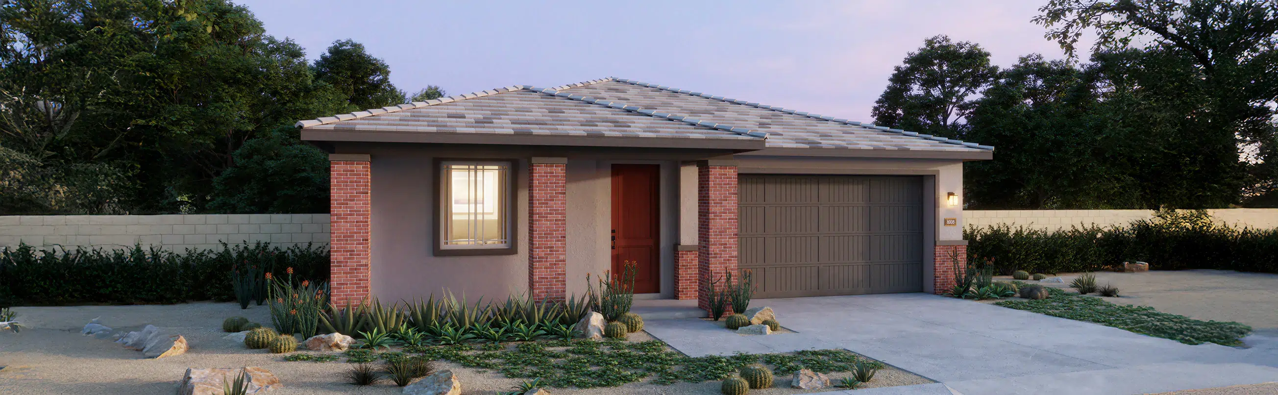 Single-story house with a mix of brick and stucco exterior, a two-car garage, front yard landscaping with rocks and desert plants, and a concrete driveway.