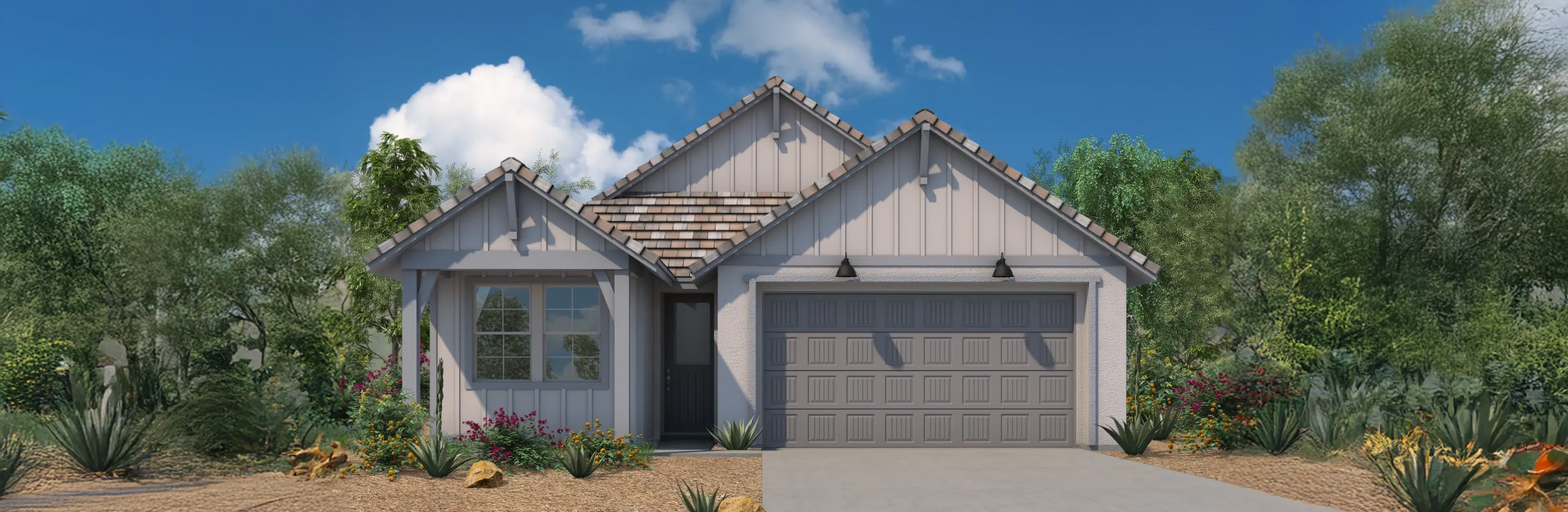 Single-story house with light-colored siding, a gable roof with shingles, a two-car garage, front yard landscaping, and clear blue sky in the background.