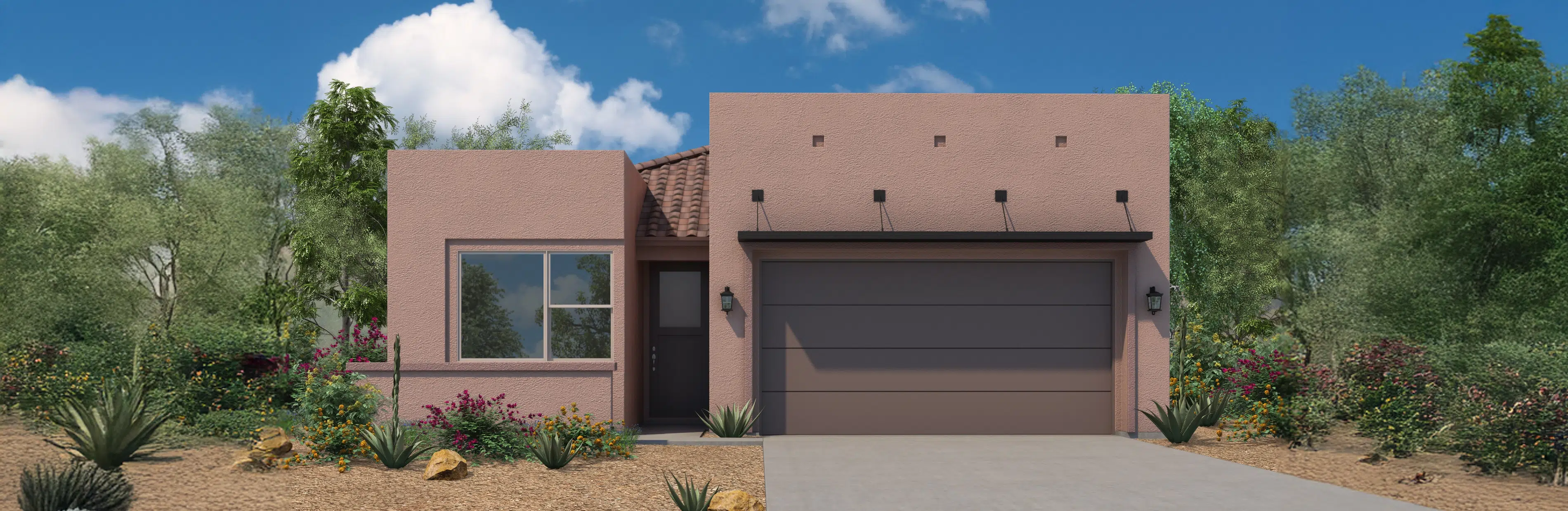 Single-story, modern stucco house with a two-car garage, flat roof, desert landscaping, and a clear blue sky in the background.