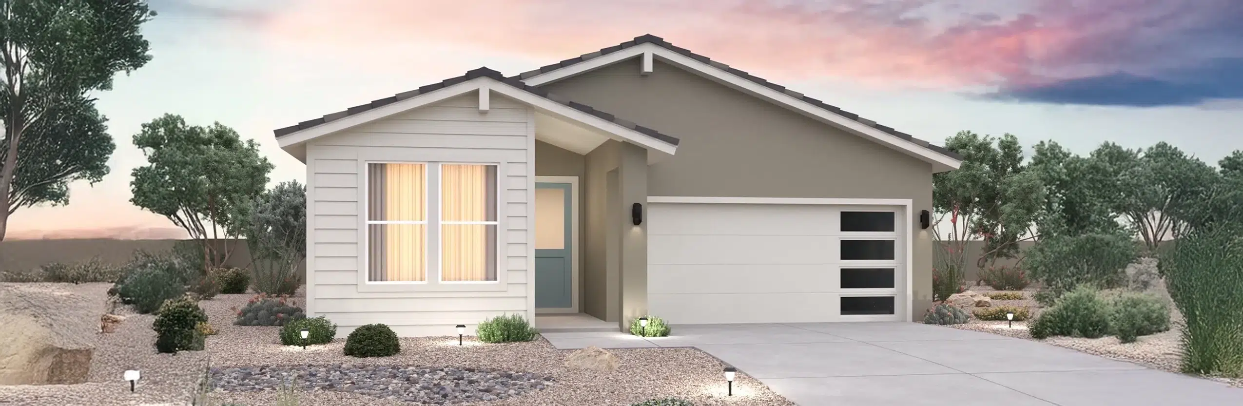 Single-story modern house with a light gray exterior, large front window, two-car garage, and desert landscaping at sunset.