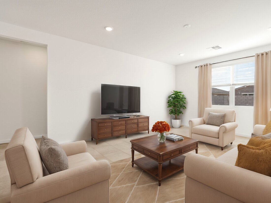 Bright living room with beige sofas, a wooden coffee table, TV on a wooden stand, potted plant, and large window with curtains letting in natural light.